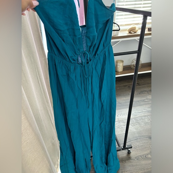 Aqua jumpsuit worn 3-4 times. Size Medium.  Adjustable strings. - Picture 3 of 7
